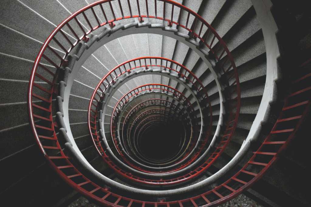 nw circular staircase loop infinity nautilus by tine ivanic via unsplash