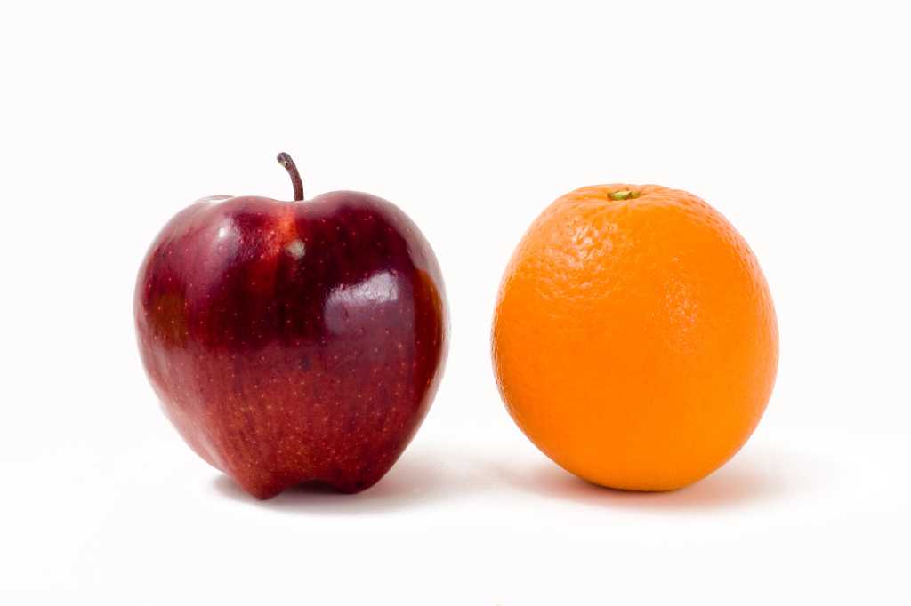 shutterstock 27853015 apple and orange against white background